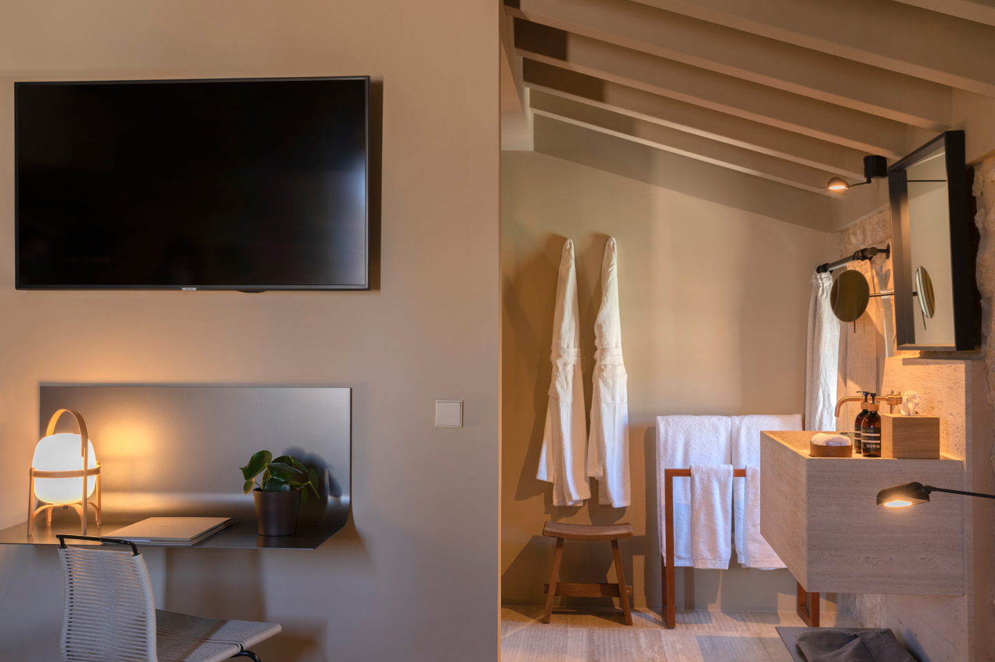 A calm superior room with a low bed, oak headboard and warm-toned linen, a doorway opening onto a private terrace washed in afternoon light